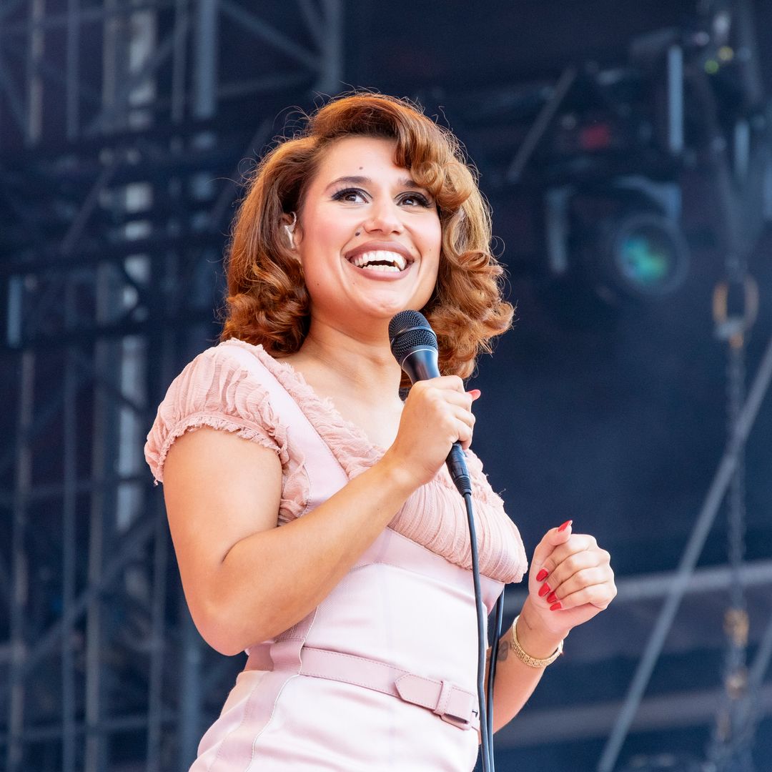 RAYE performs on stage during day two of Lollapalooza Berlin on July 13, 2025 in Berlin