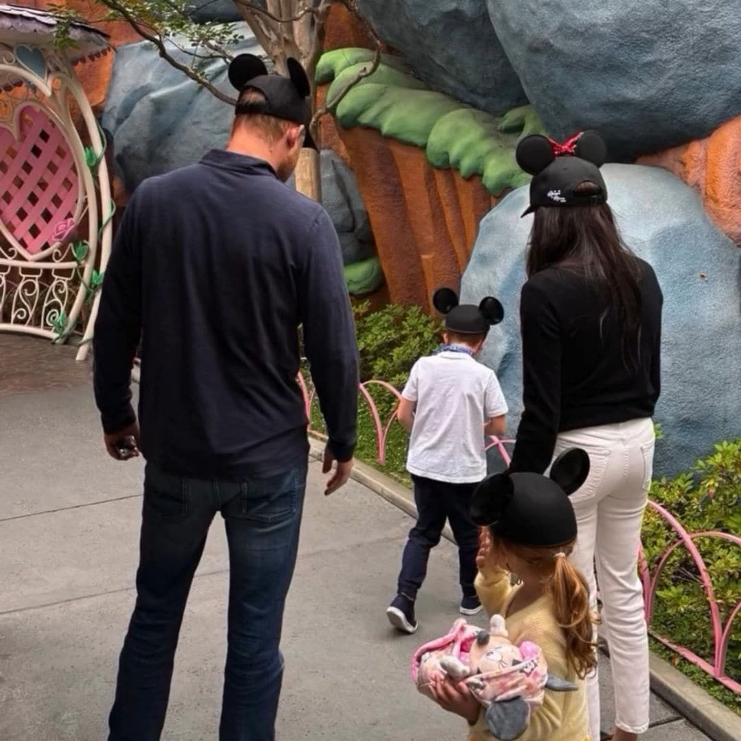 The family of four got into the Disney spirit wearing mouse ear hats