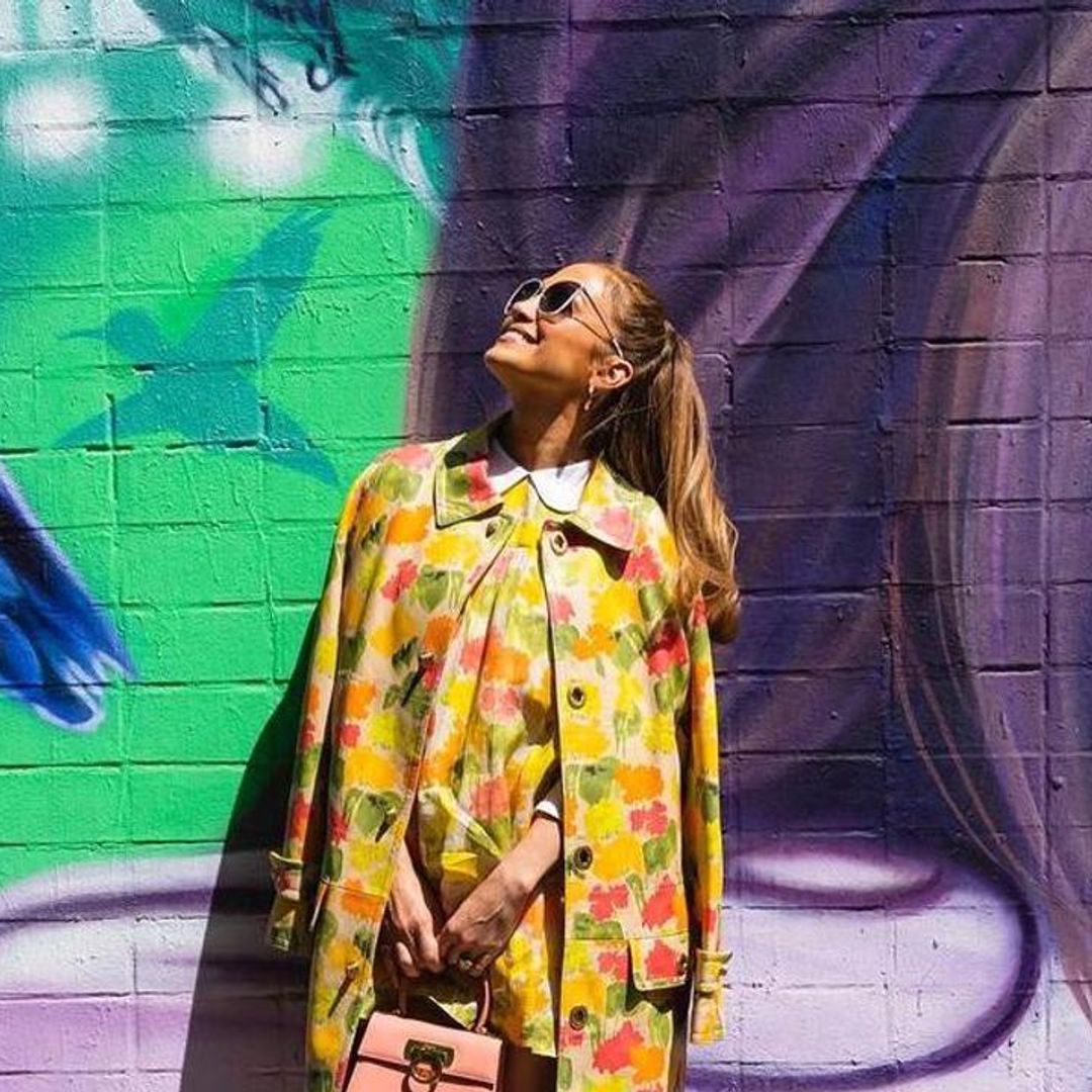 Jennifer Lopez visits a stunning mural of herself in New York before the premiere of Halftime