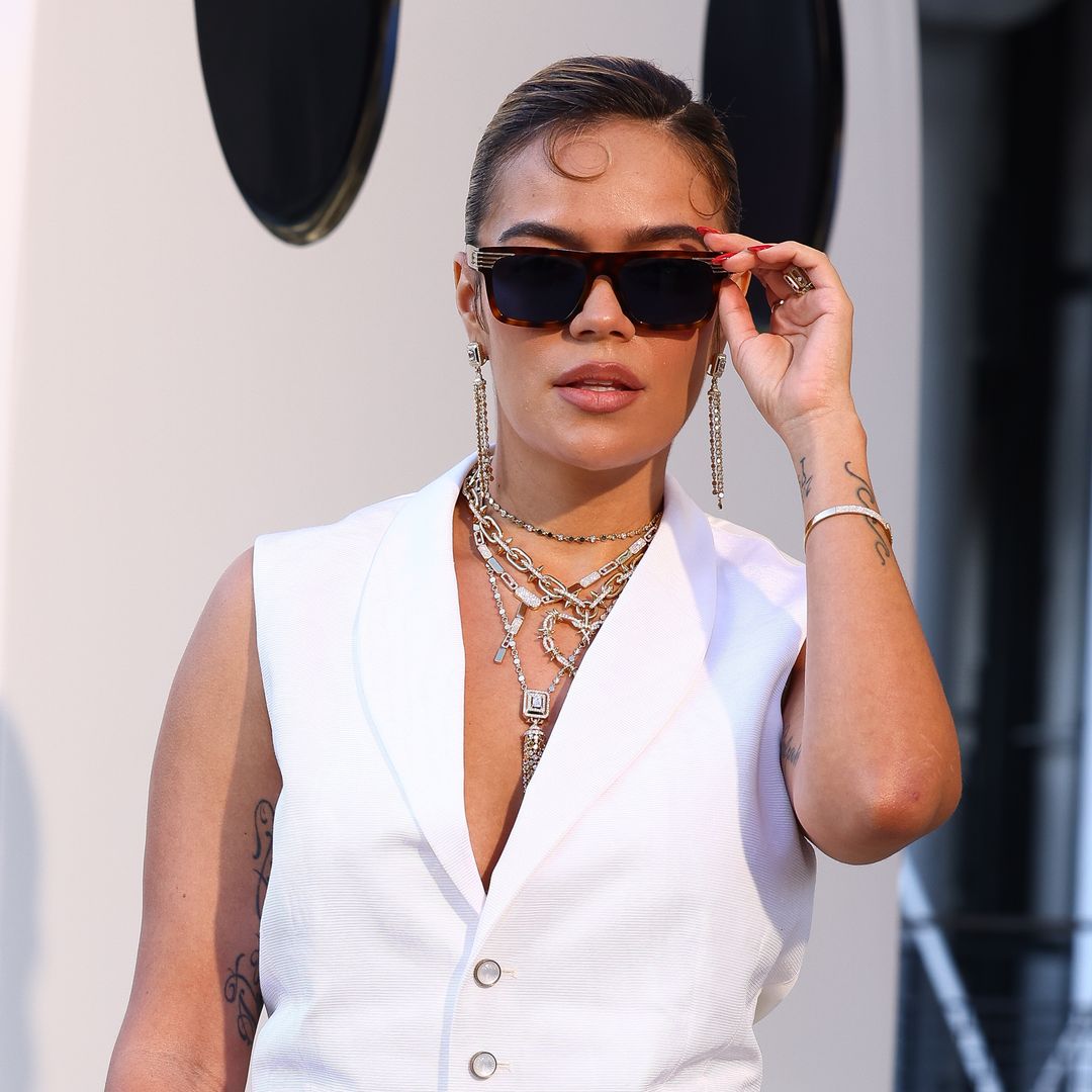 Karol G rocks the most high-fashion but wearable look at Louis Vuitton's SS26 Paris Show