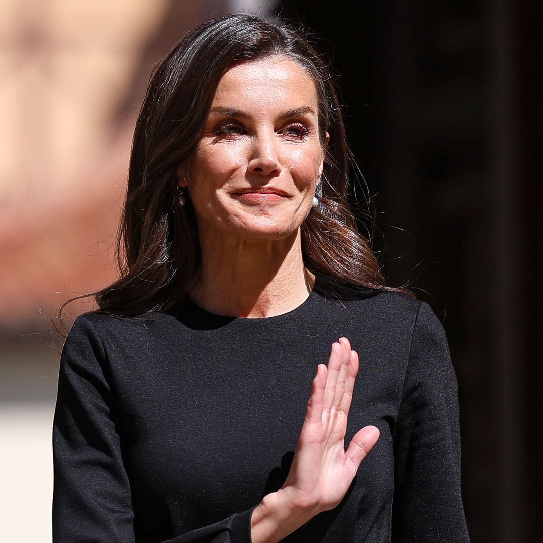 Queen Letizia gives her classic black dress a modern twist with one bold accessory