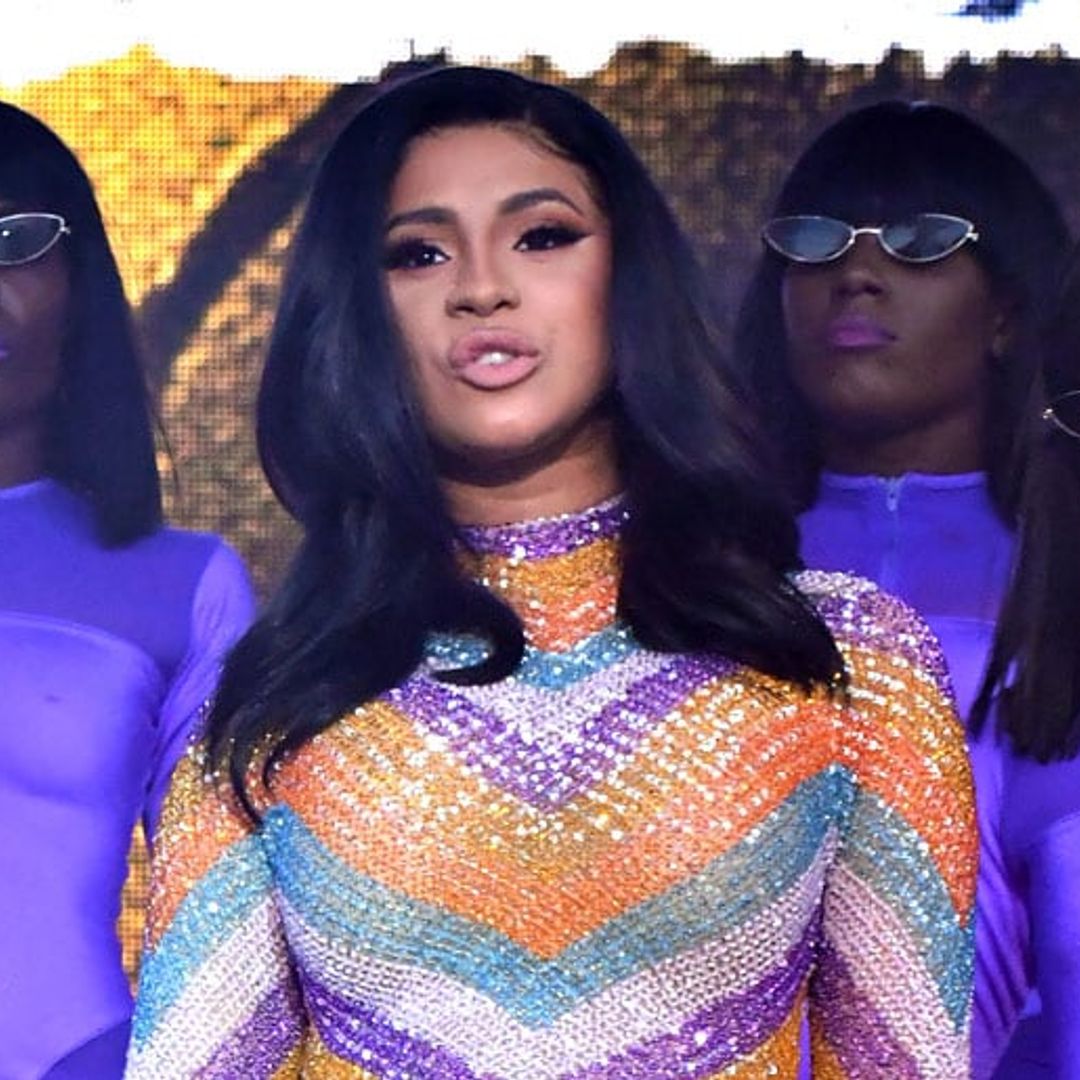 Cardi B performs in her bathrobe after suffering wardrobe malfunction – see the look!