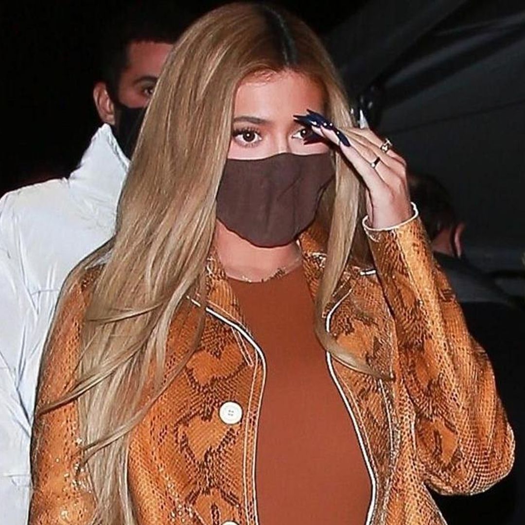 Kylie Jenner went to dinner in a stunning $3,000 snakeskin print coat