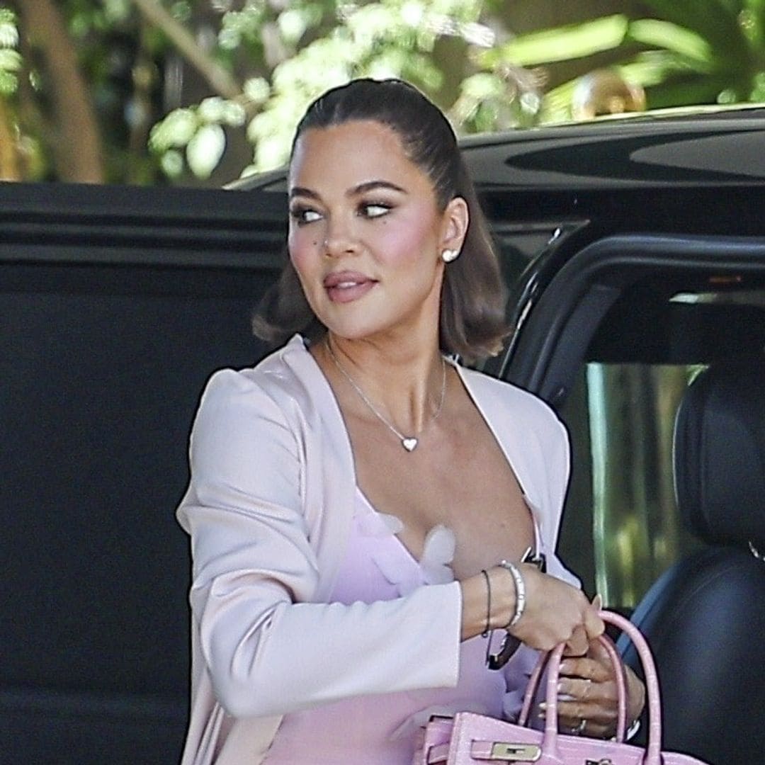 Khloé Kardashian steals the show in pink minidress to celebrate Kim Kardashian's law school graduation
