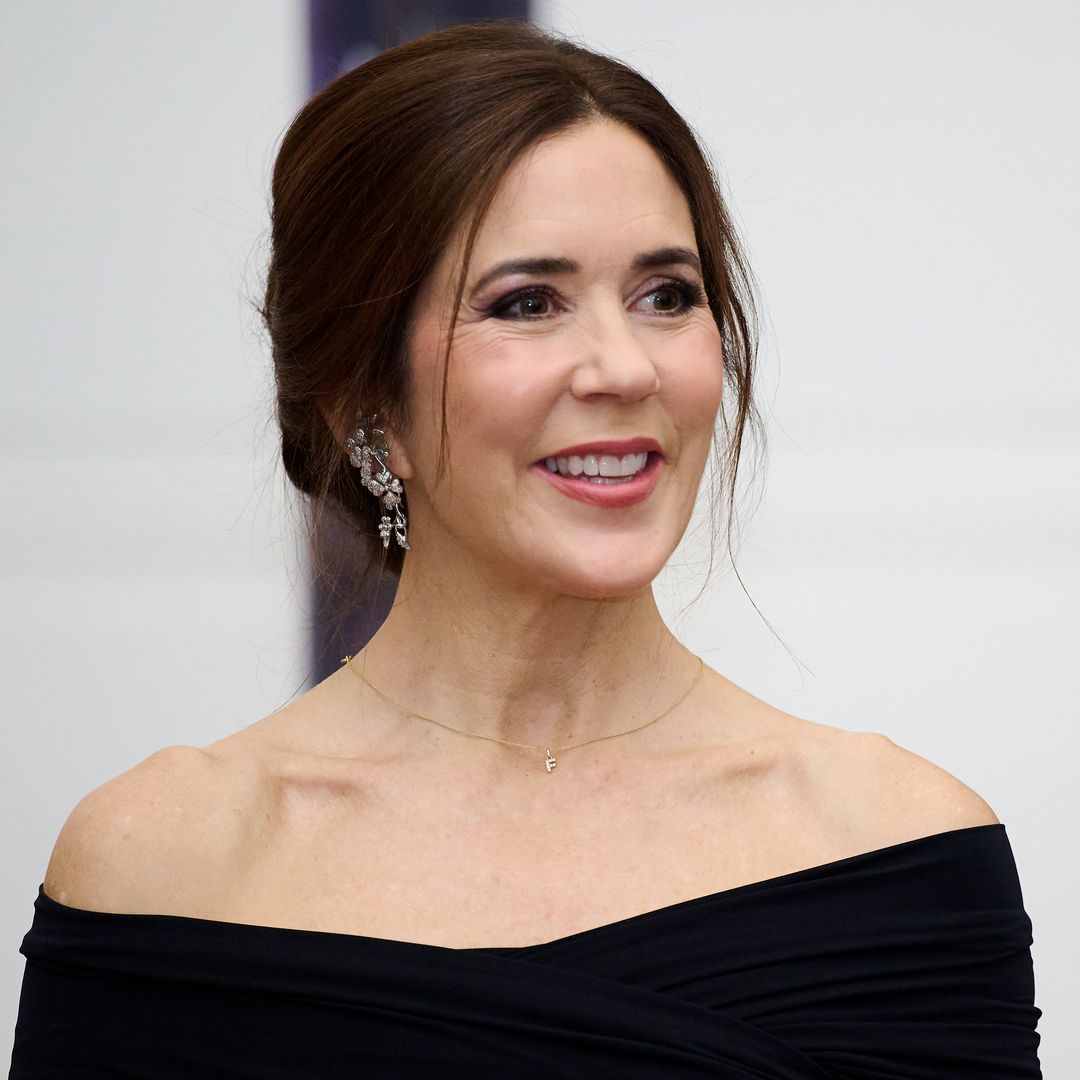 Queen Mary turns heads in sheer top, patent heels and gold-diamond jewels at Copenhagen concert