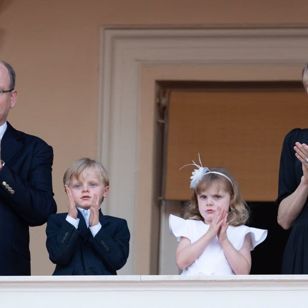 Princess Charlene and Prince Albert paint Easter eggs with their twins in new family photo