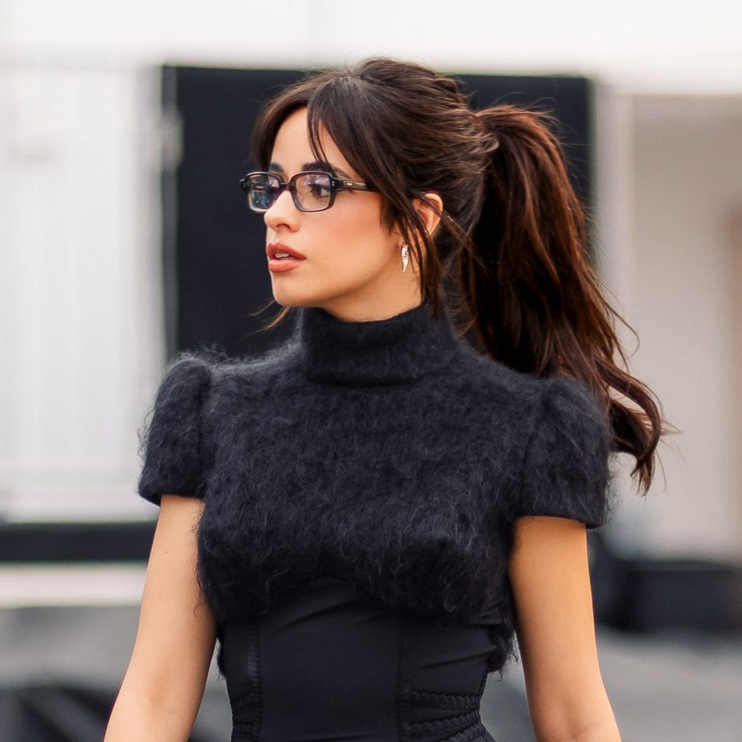 Camila Cabello is all smiles holding hands with Patrick Ta during Art Basel Miami