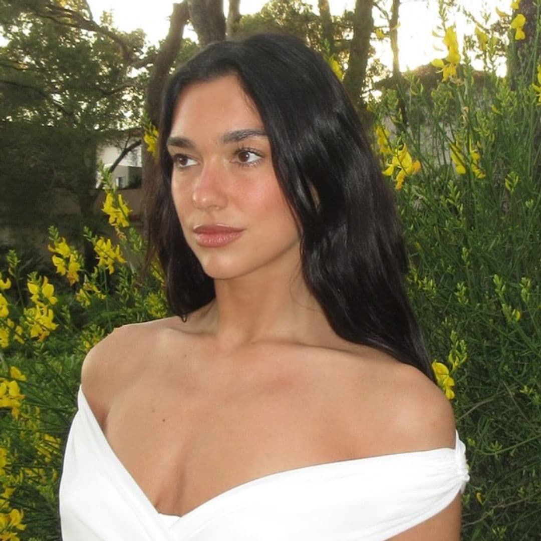 Dua Lipa poses in bridal white dress amid engagement to Callum Turner