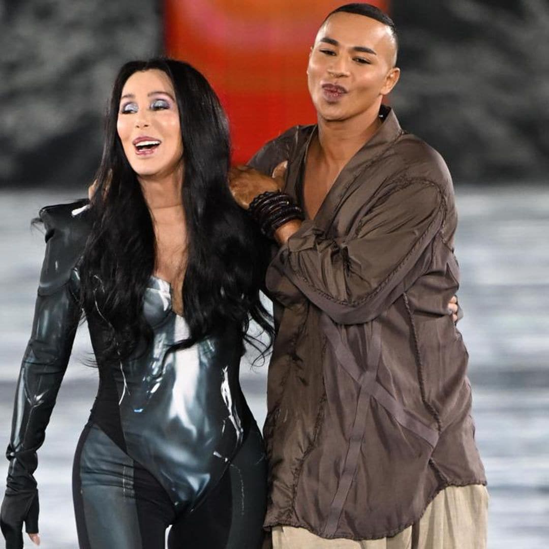 Cher makes surprise appearance at Paris Fashion Week, walking for Balmain in skintight bodysuit