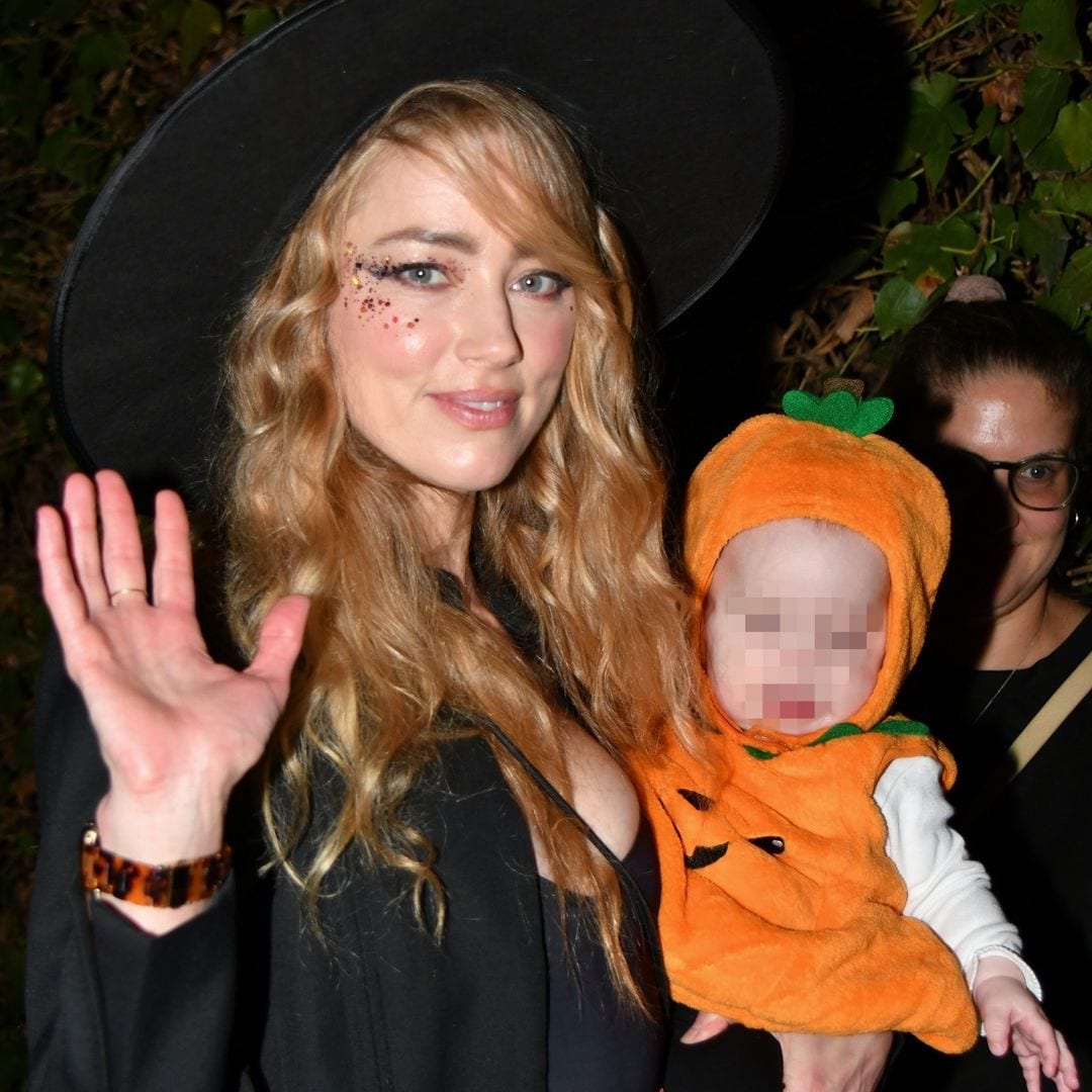 Amber Heard seen with twins for the first time while trick-or-treating in Madrid