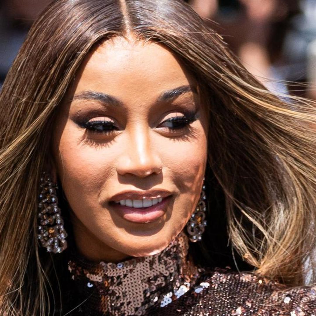 Is Cardi B in legal trouble after throwing mic at concertgoer?