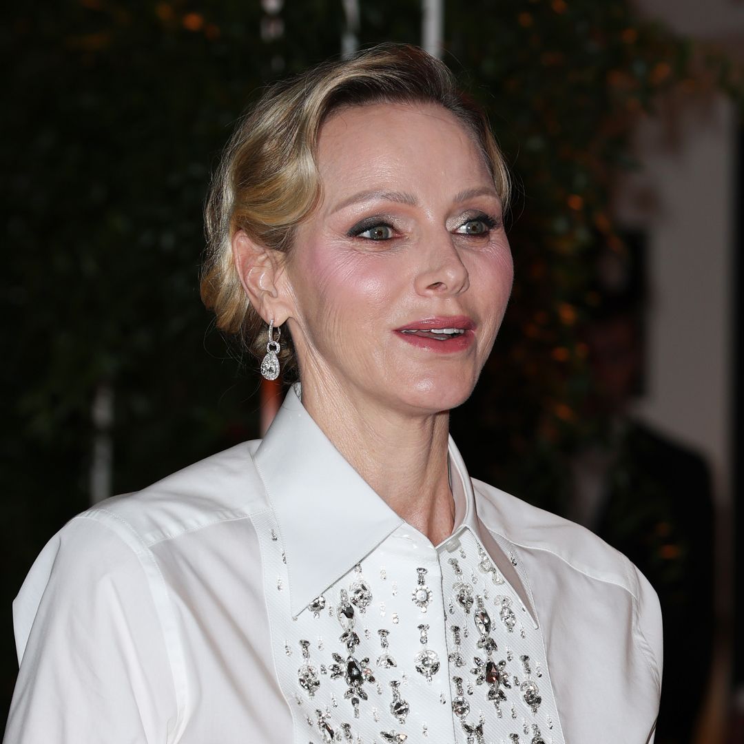Princess Charlene revives Queen Rania’s iconic white shirt and long skirt look at Formula 1 gala