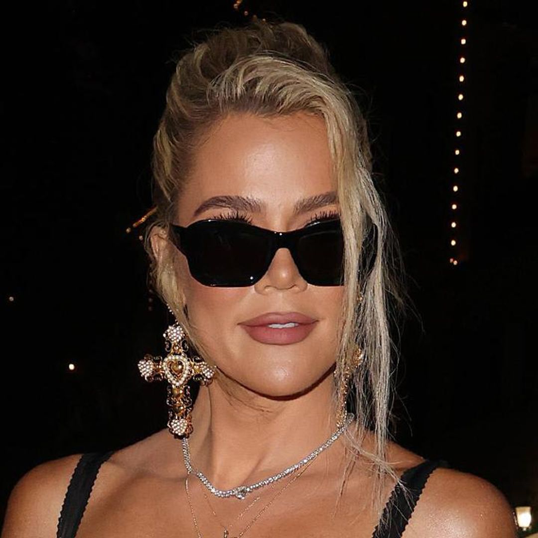 Khloé Kardashian and True Thompson pose in matching Dolce leopard looks