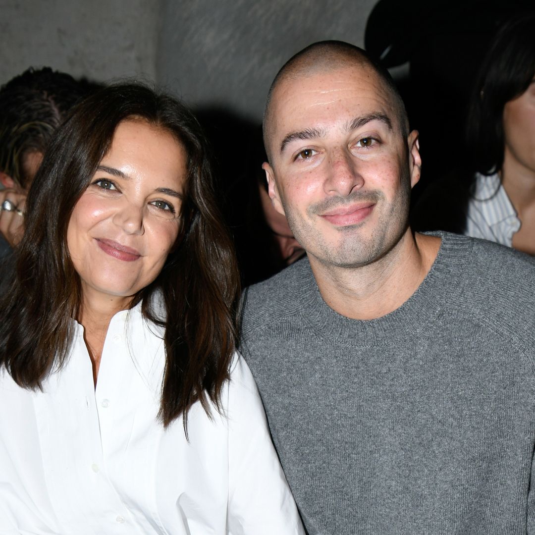 Katie Holmes and Jason Bard Yarmosky look cozy together while front row at Paris Fashion Week