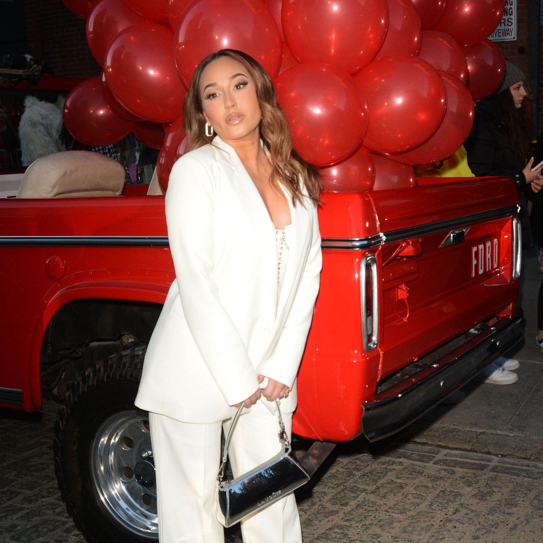 Adrienne Bailon-Houghton shares her motherhood joys, faith rituals, and her love for Latino household staple