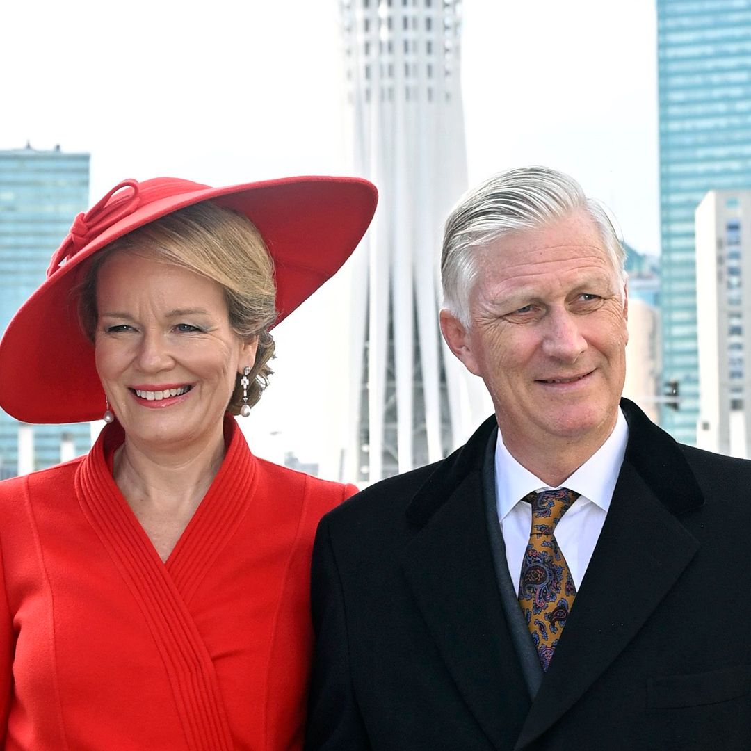 Queen Mathilde makes a bold statement in red and shares a sweet moment with King Philippe