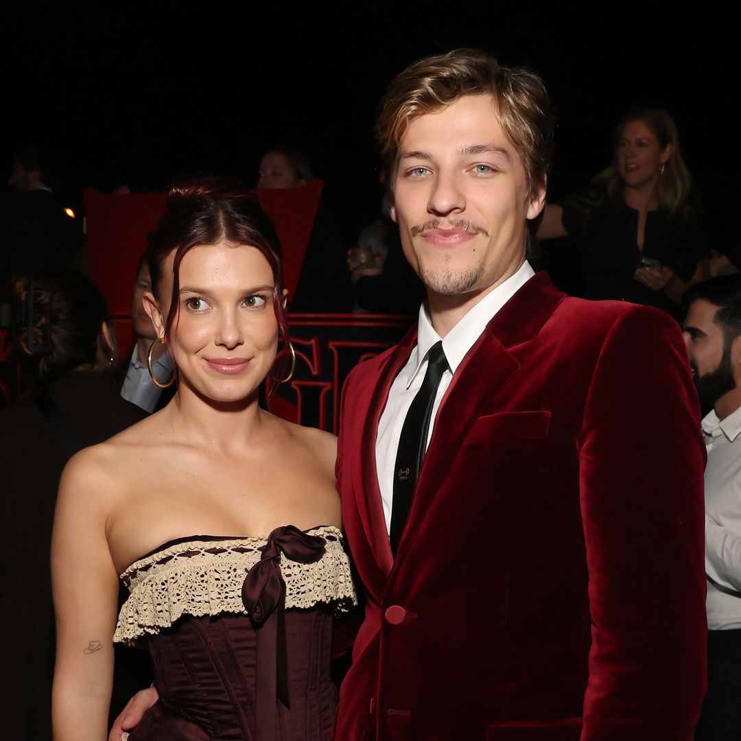 Millie Bobby Brown glows in a pink crop top on date night with Jake Bongiovi