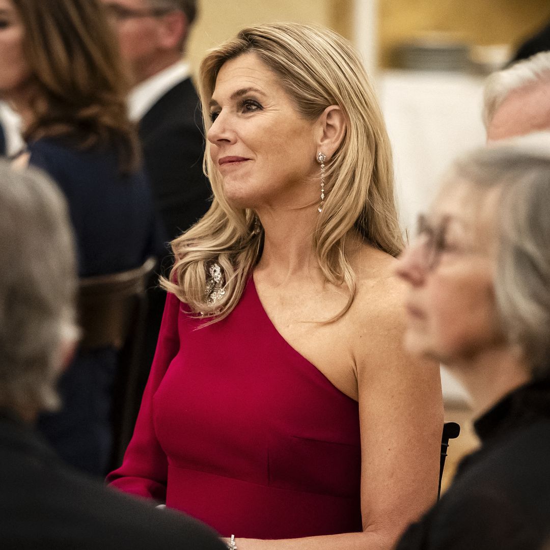 Queen Máxima gives her striking red gown a glamorous twist for royal palace dinner