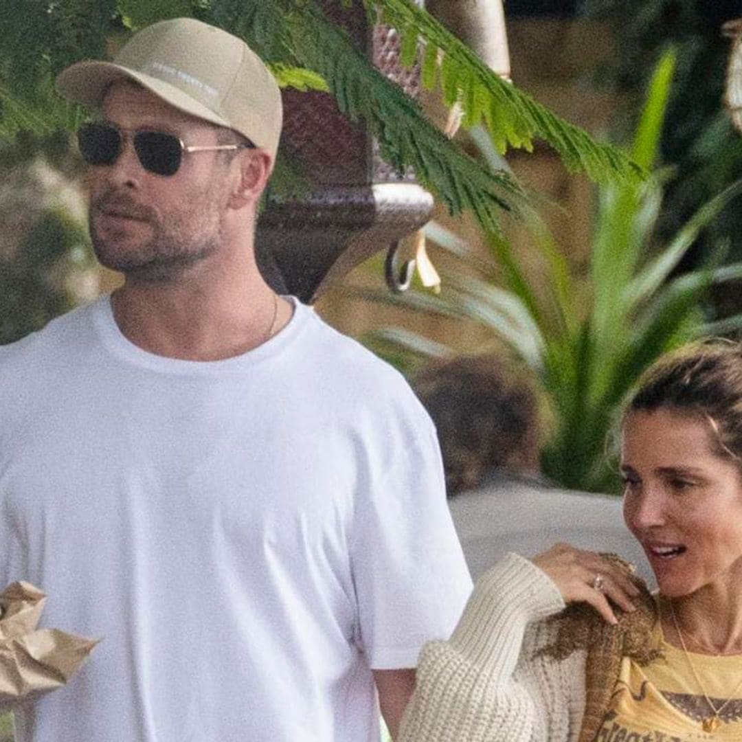 Elsa Pataky and Chris Hemsworth take their reptilian family member to the deli