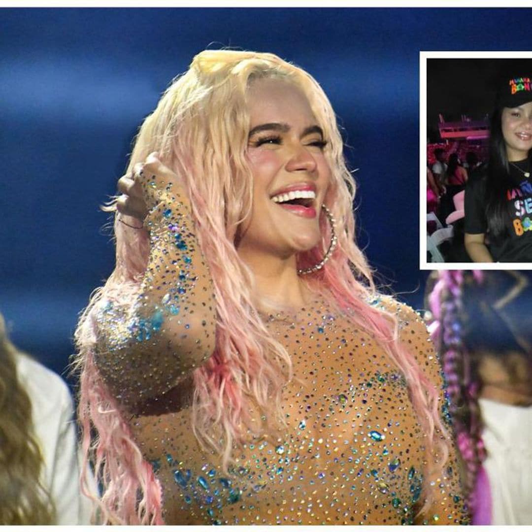 Karol G helps a fan with her gender reveal during the singer’s Dominican Republic concert