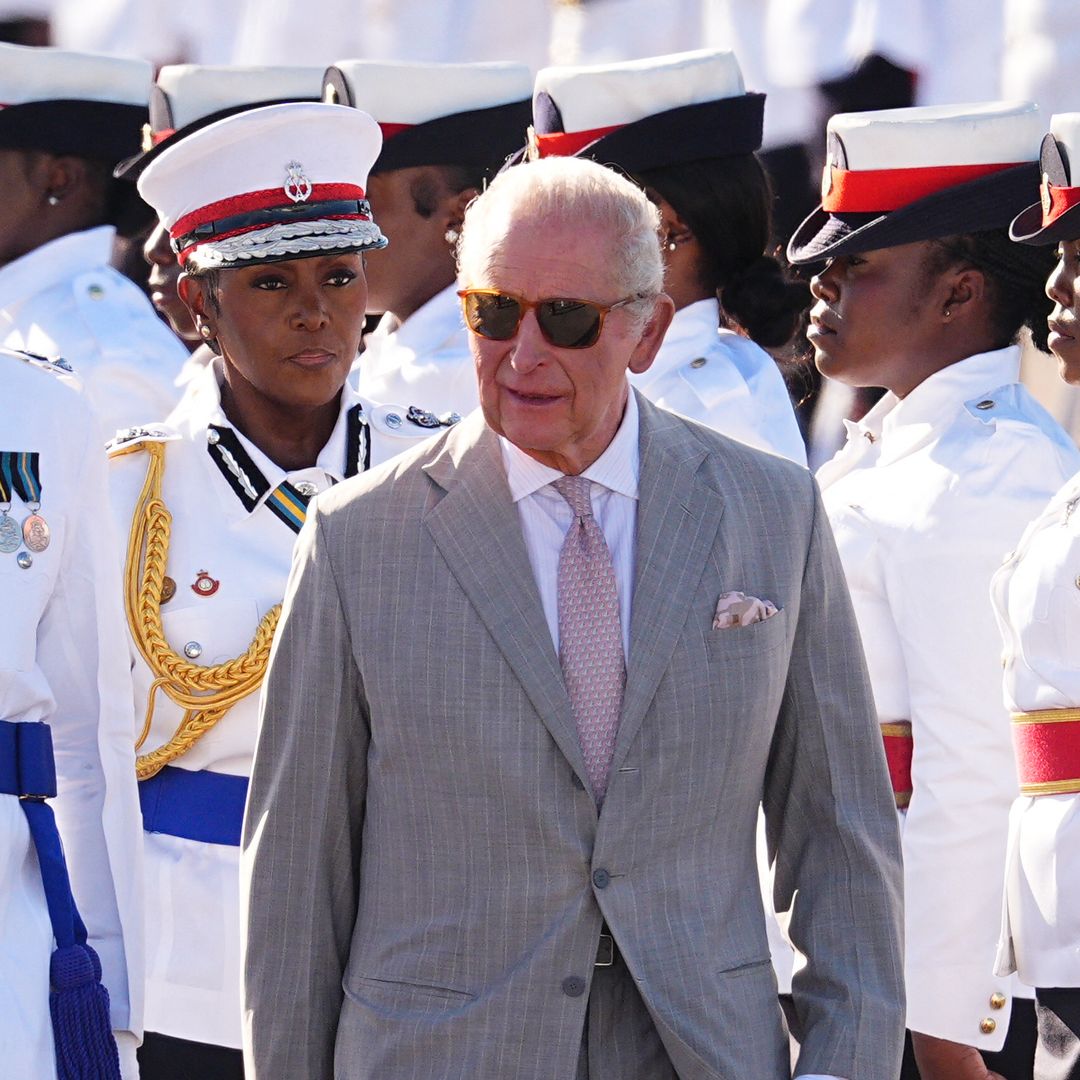 King Charles dances through Junkanoo Parade and laughs at his boxing champion makeover in the Bahamas
