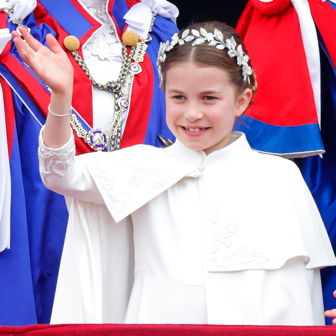 Princess Charlotte of Wales watches an RAF flypast from the balcony of Buckingham Palace following the Coronation of King Charles III & Queen Camilla at Westminster Abbey on May 6, 2023 in London, England.