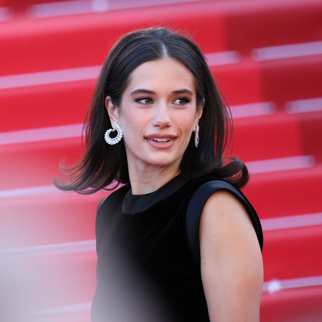 John Travolta’s Daughter, Ella Bleu, proves the classic '60s blowout is the only hairstyle you need for your next special occasion