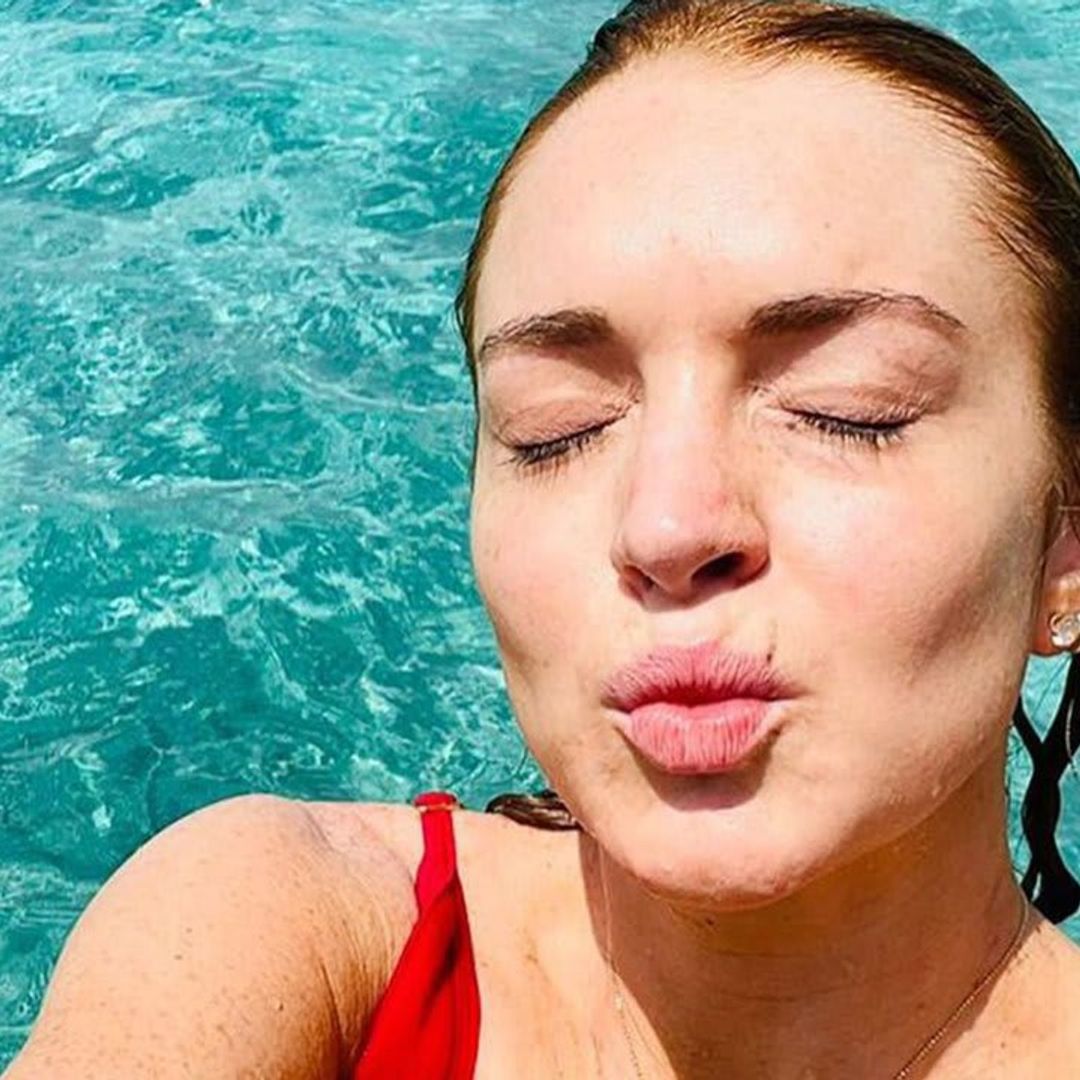 Lindsay Lohan bares it all in plunging red swimsuit in Maldives