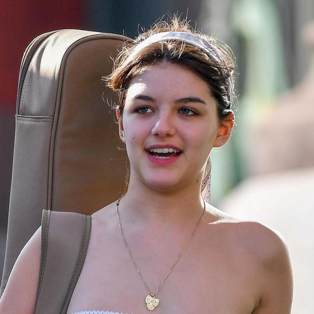 Suri Cruise is ready for summer in tube top and shorts on her way to guitar practice