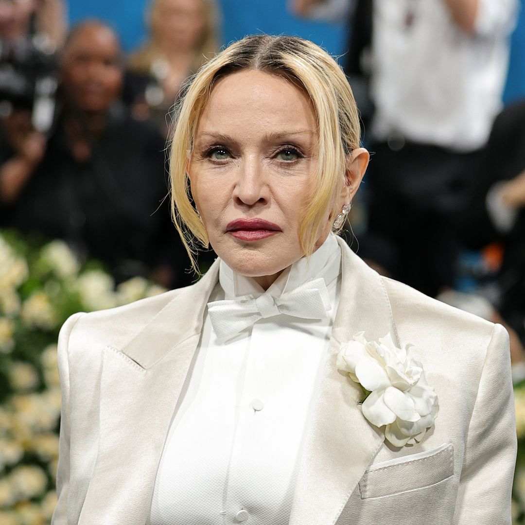 Madonna heats things up in bed with handsome co-stars in her bold new ad