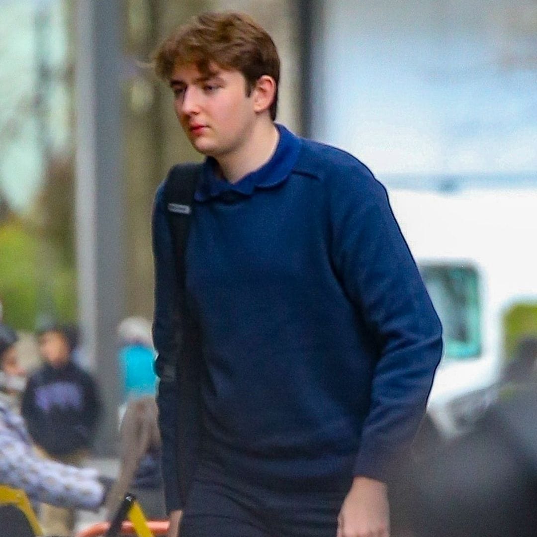 Barron Trump blends in with a blue sweater and college style at NYU