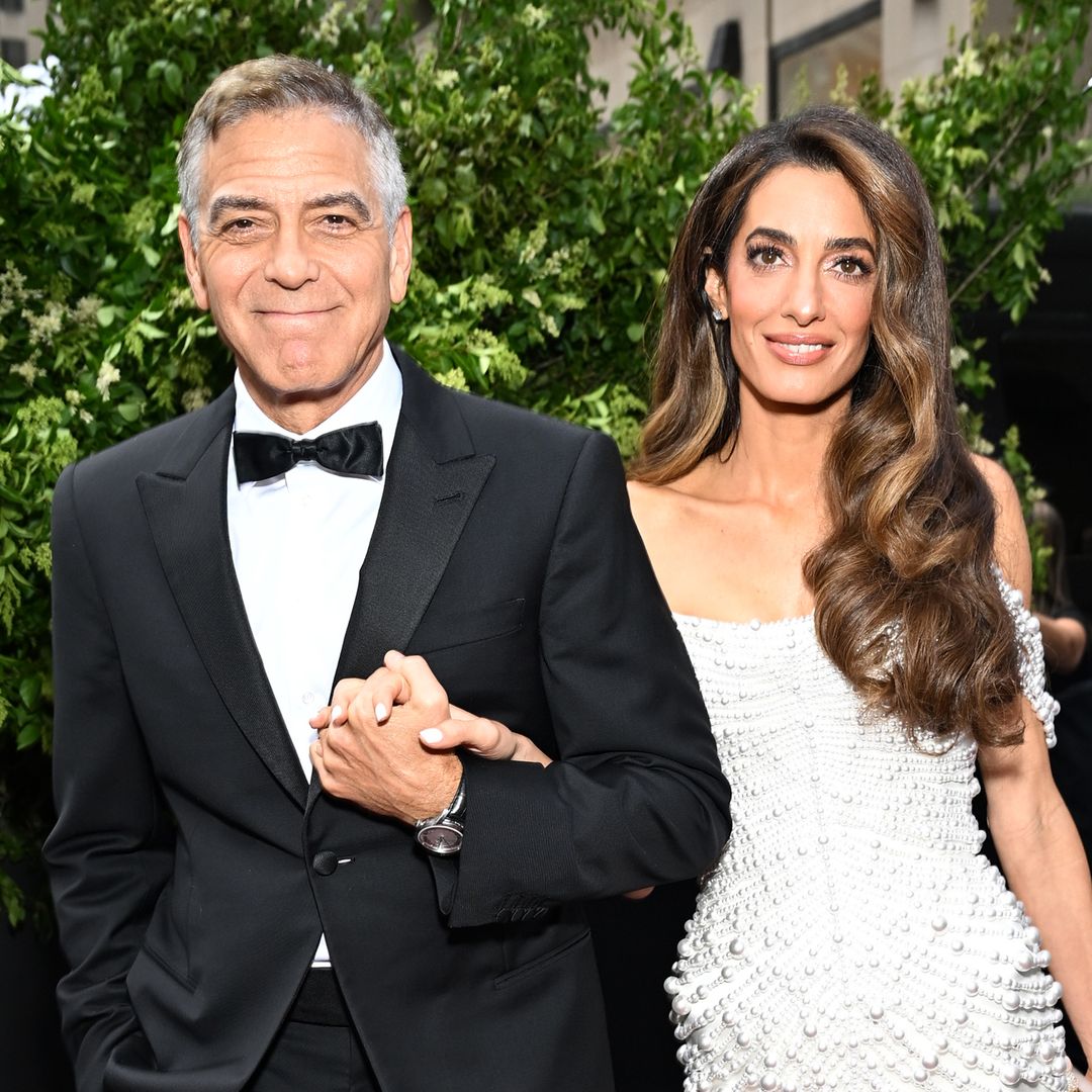 Amal Clooney turns heads in tight-high slit dress during special night out with George Clooney