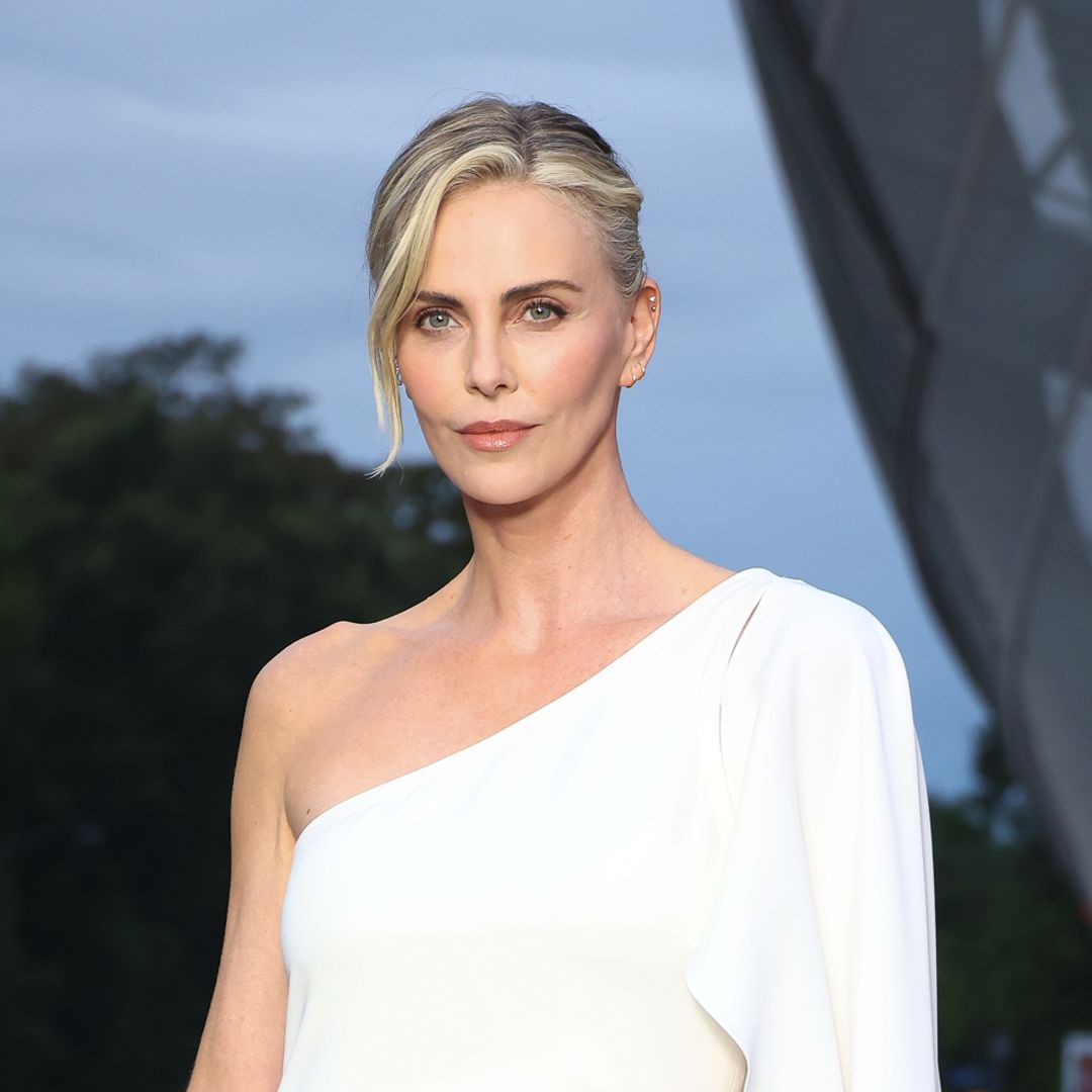 Charlize Theron stuns in a sexy and lacy catsuit