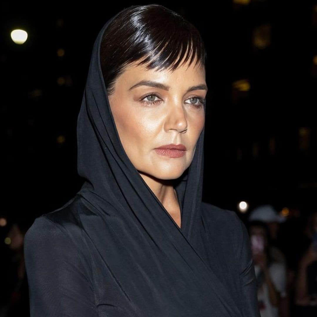 Katie Holmes shows her edgy side in black skin-tight dress and blunt bangs at New York Fashion Week