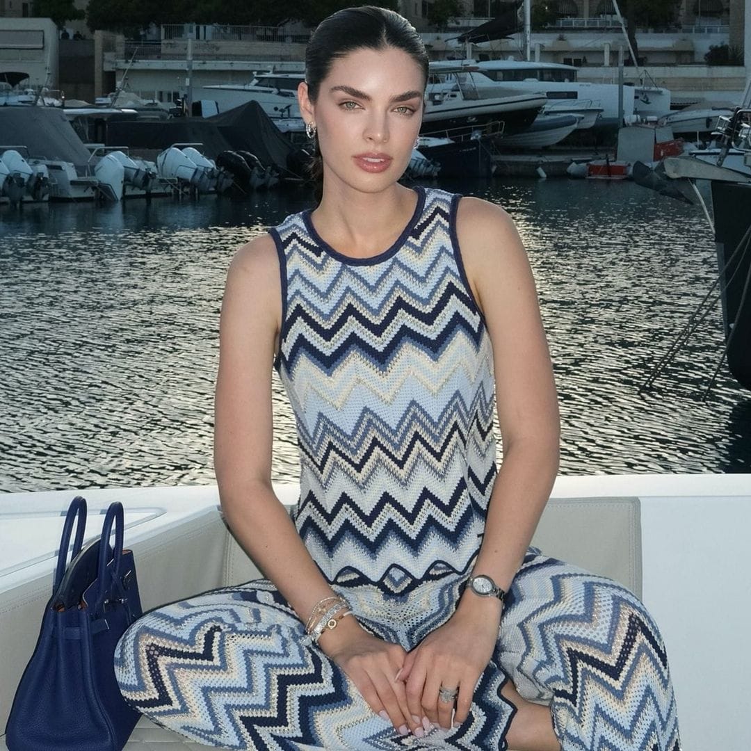 Nadia Ferreira nails nautical style in zigzag crochet during a day at sea with Marc Anthony