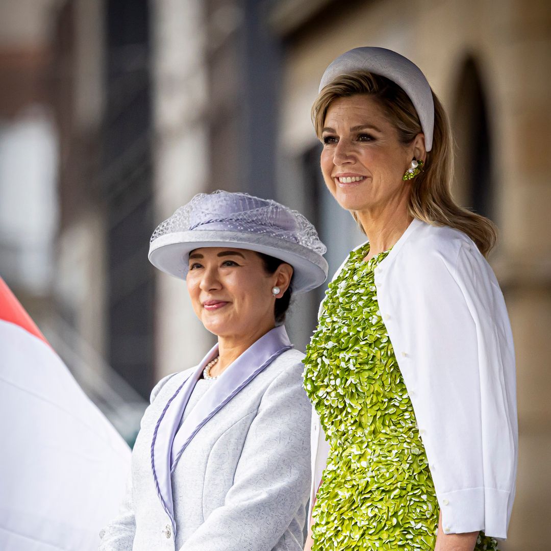 Queen Máxima shines in bold green dress with floral appliqués while Empress Masako opts for silk skirt suit and matching gloves