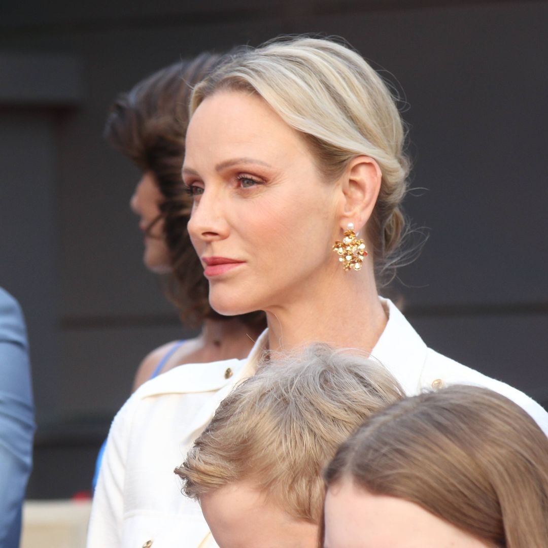Princess Charlene adds a golden touch to sophisticated power suit for palace appearance