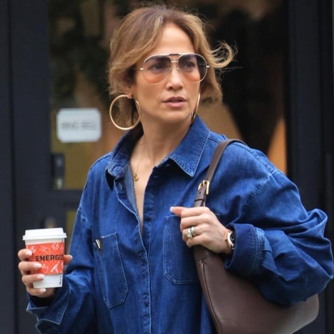 Jennifer Lopez shows off her street style in daring denim dress with high leg slits