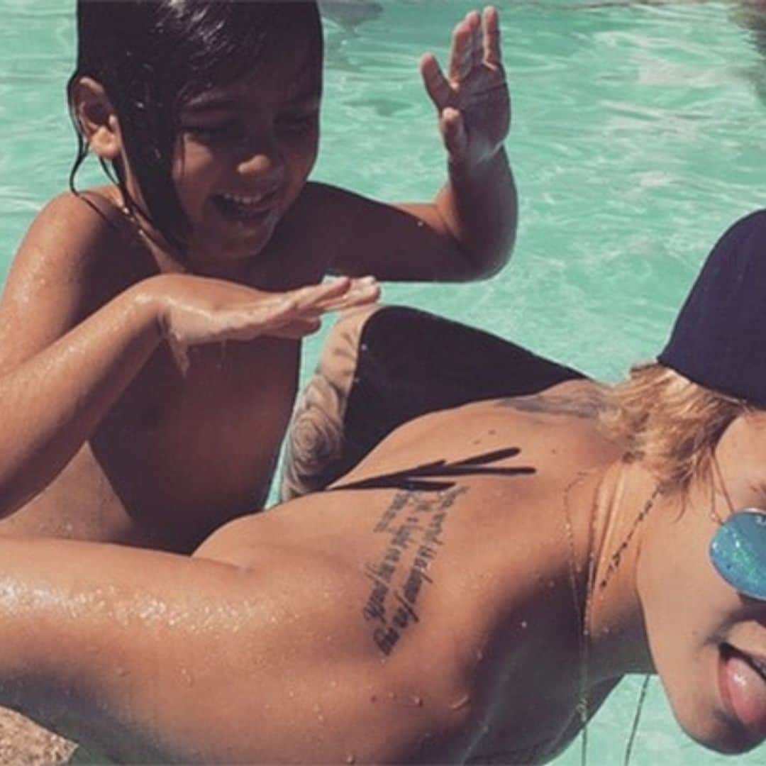 Shirtless, tanned Justin Bieber and Mason Disick have fun pool day