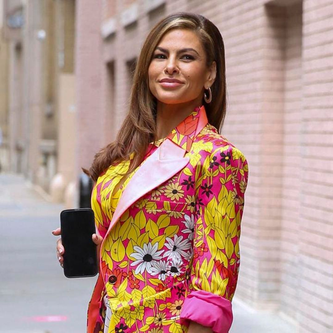Eva Mendes looks stunning in a colorful floral dress while visiting the set of ‘The View’