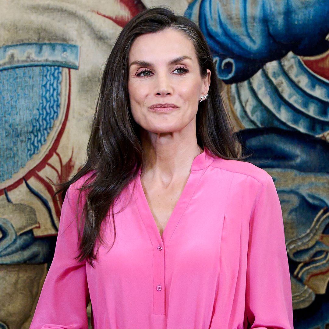 Queen Letizia swaps her papal white looks for a striking oversized pink dress and Spanish espadrilles