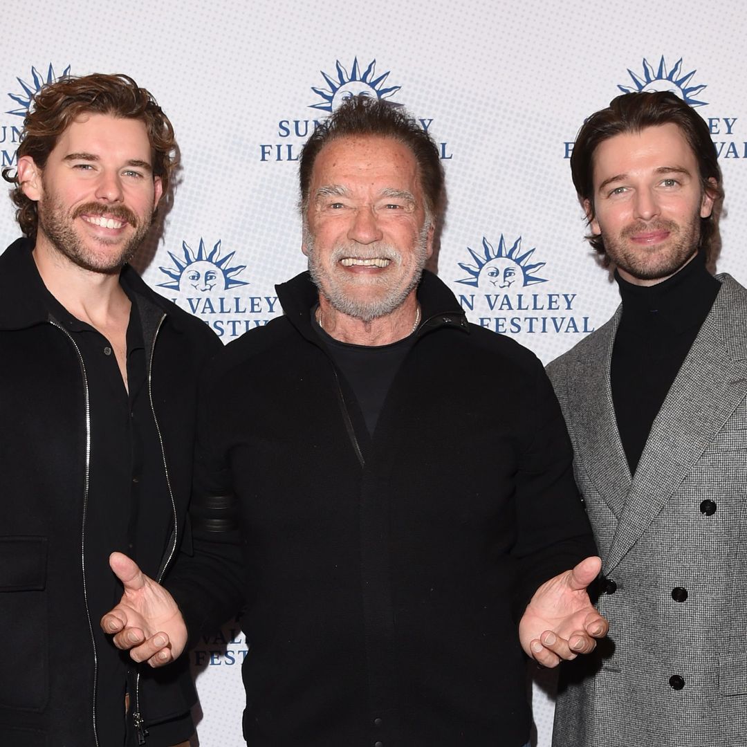 Arnold Schwarzenegger steps out for rare red carpet moment with sons Patrick and Christopher