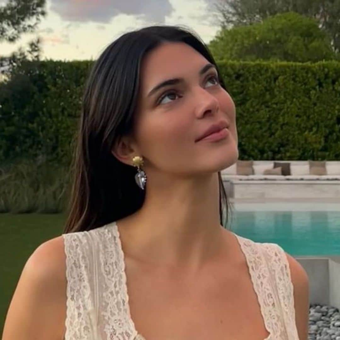 Kendall Jenner poses in nothing but a button-down shirt while relaxing in bed: ‘off-duty attire’