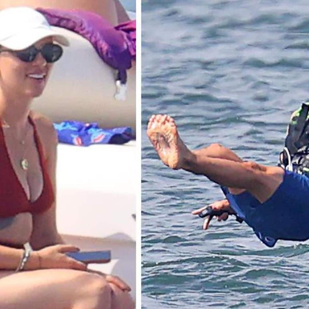 Scarlett Johansson rocks a red bikini with Colin Jost at the Hamptons