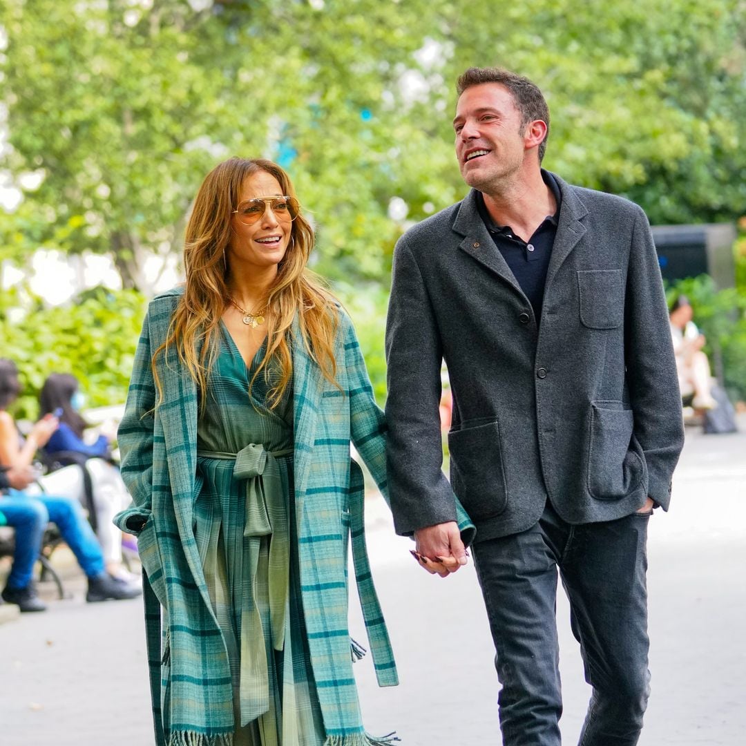 Ben Affleck and Jennifer Lopez's kids, Fin and Emme, share an affectionate moment during outing