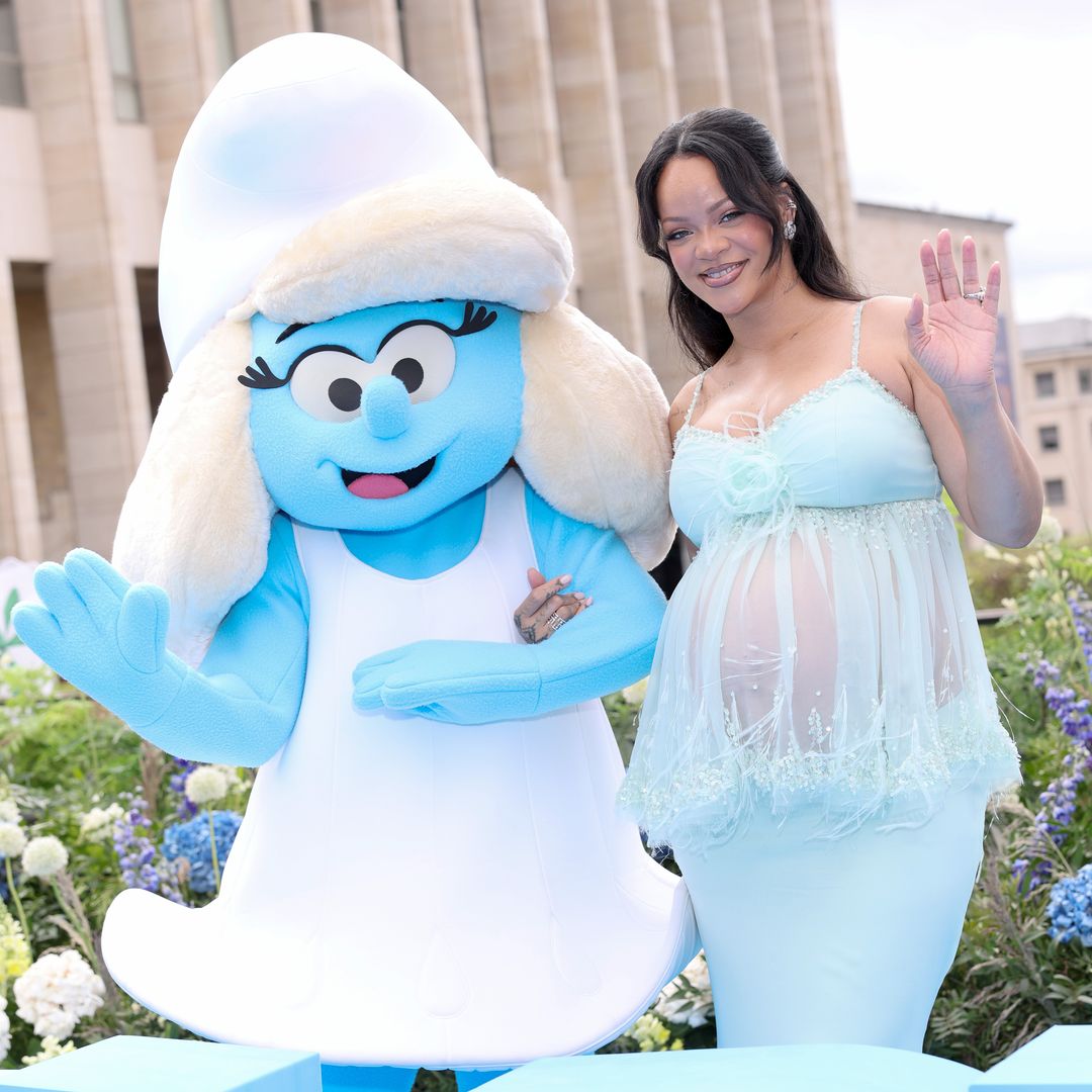 Rihanna shows off her baby bump in sheer Chanel look at Smurfs premiere