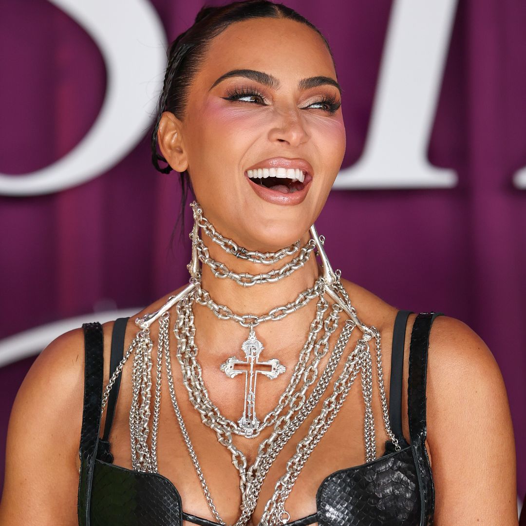 Kim Kardashian defies December chill in leopard print bikini selfie