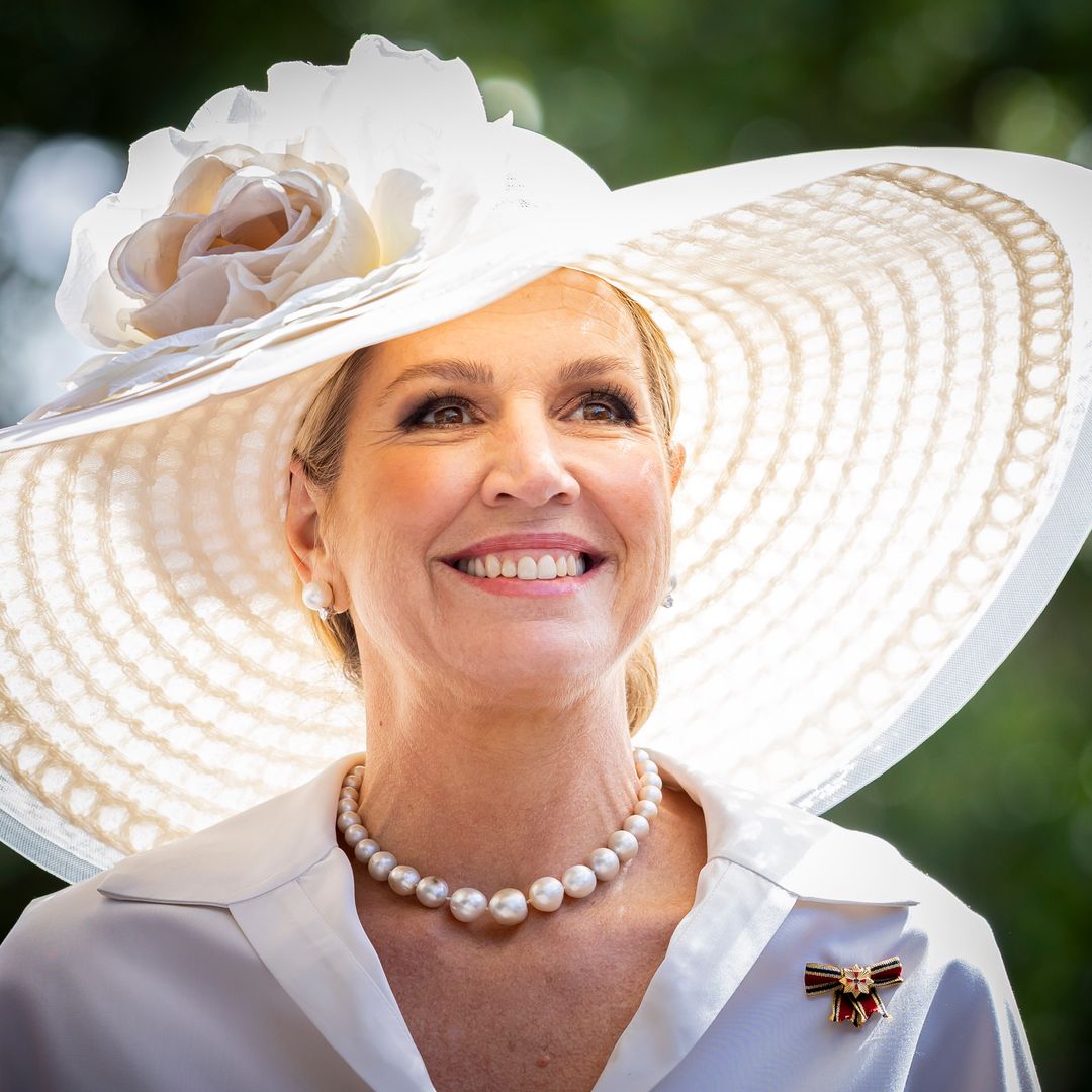 Queen Máxima embraces soft pink satin and suede with floral-inspired jewelry in London