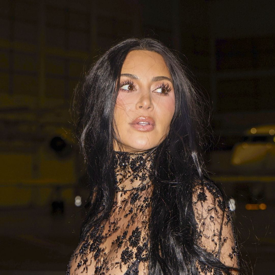 Kim Kardashian stuns in a lace catsuit and dramatic cape amid Lewis Hamilton romance rumors