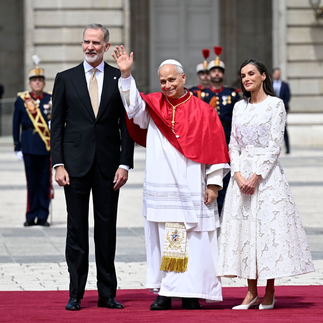 Queen Letizia honors Vatican tradition in a white lace dress for Pope Leo XIV